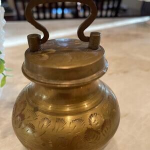 Vintage brass covered jar. Urn. Etched with handle